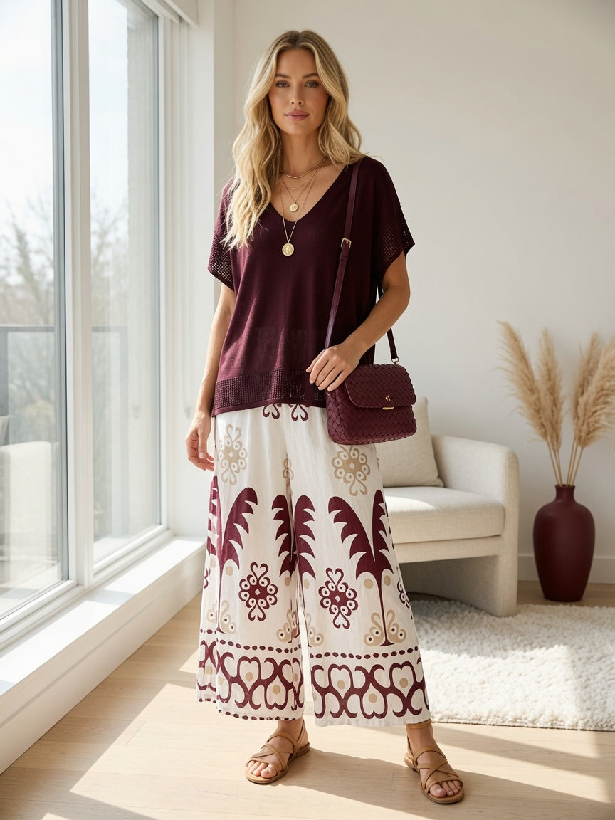 Blusa de punto fino con detalles calados