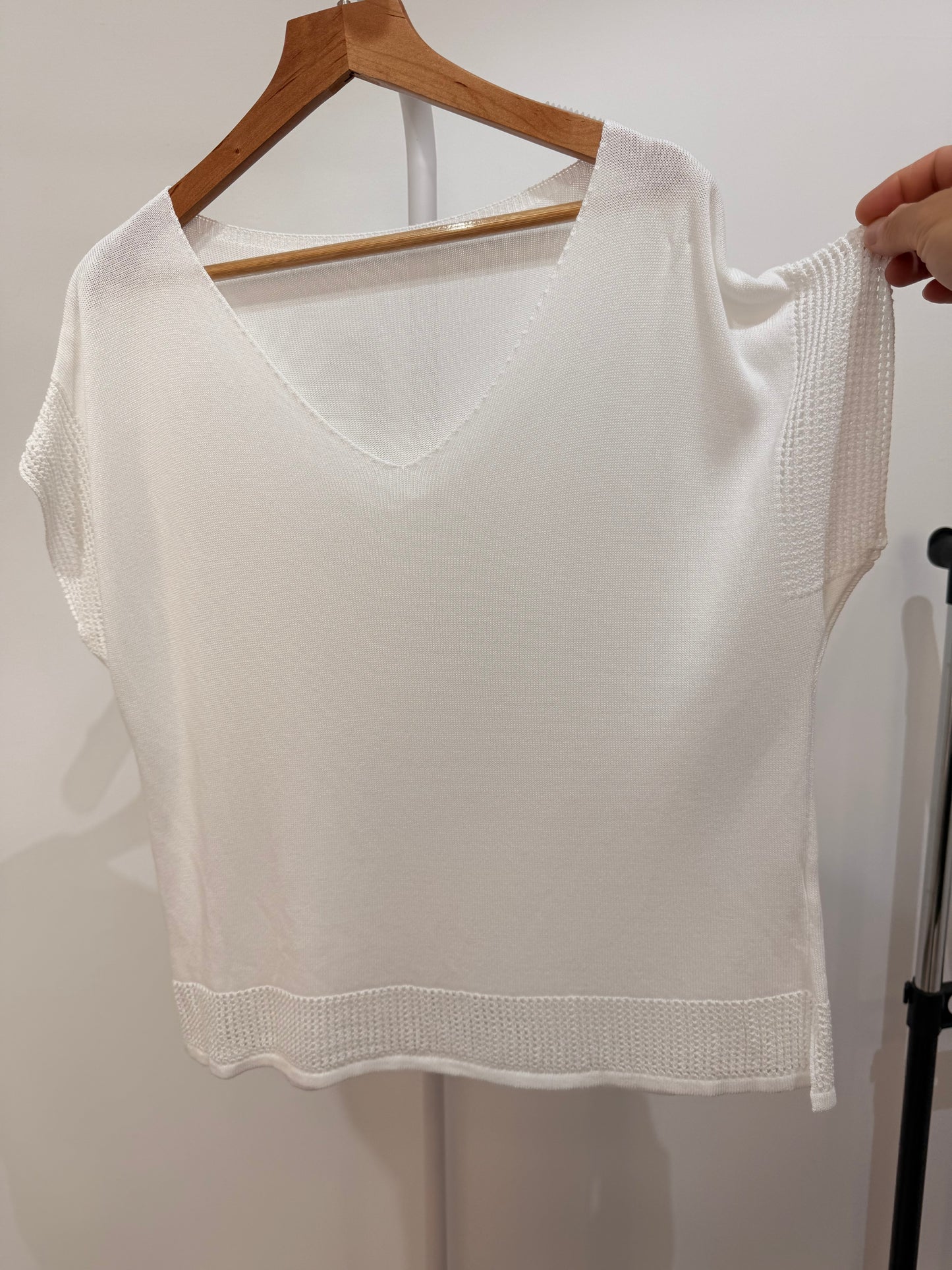 Blusa de punto fino con detalles calados