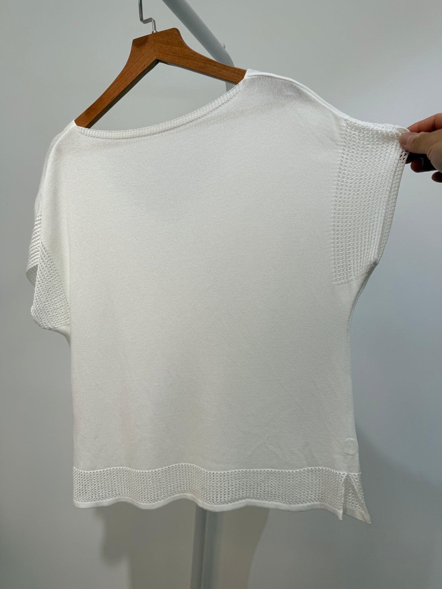 Blusa de punto fino con detalles calados